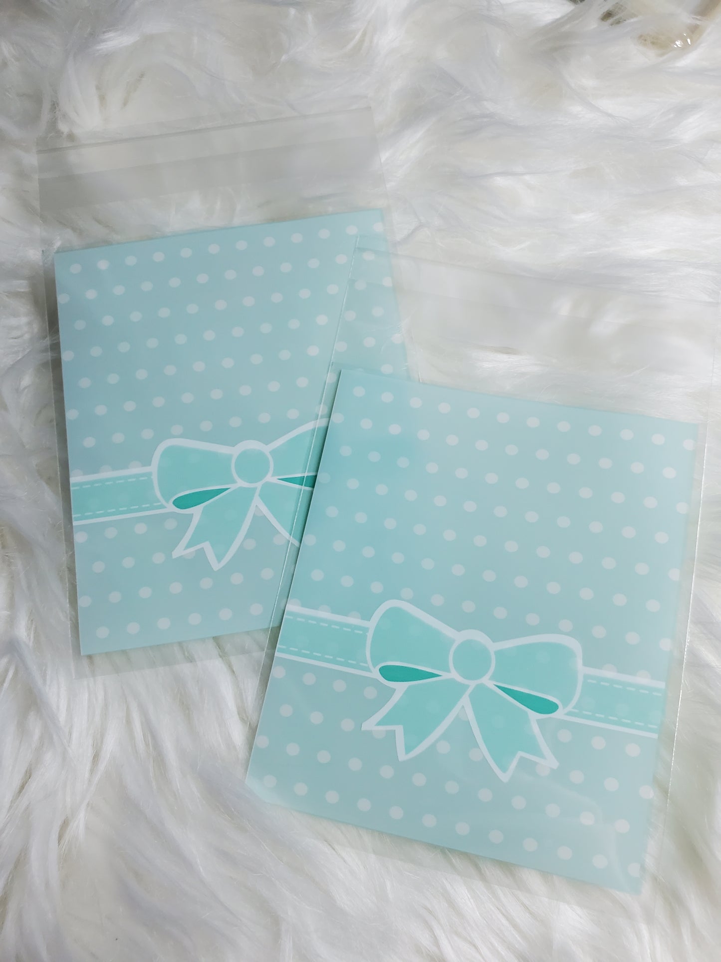Cellophane teal dots 3x4in
