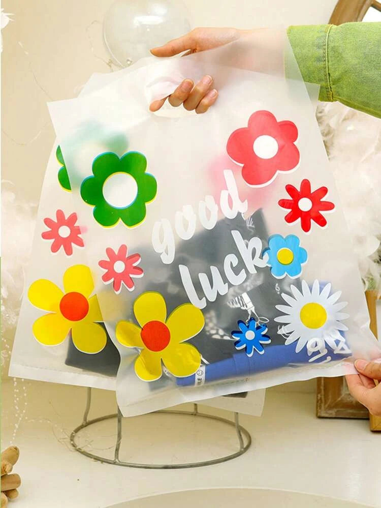 Clear floral 8x10in aprox merch bags